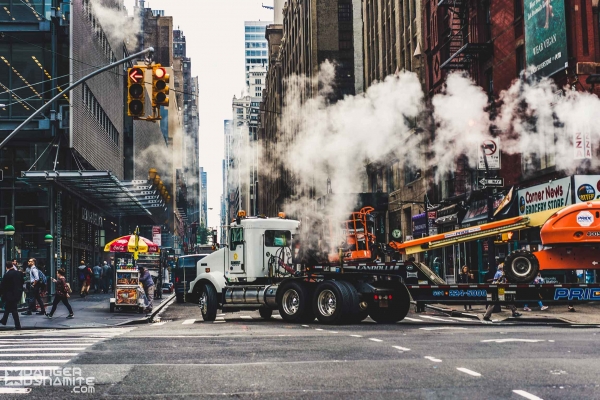 Tow truck making a corner in downtown NYC